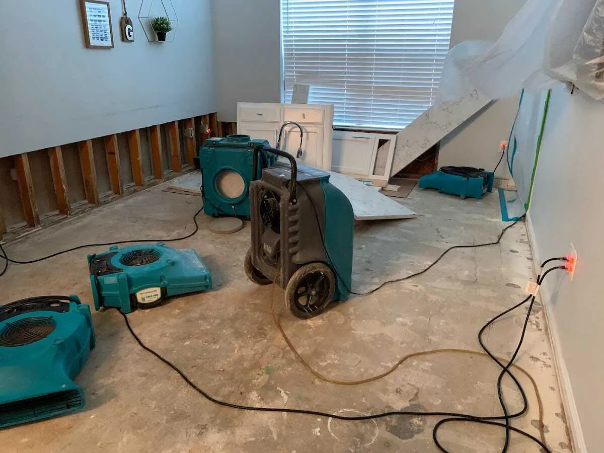 Dehumidifier in flood-cut room for Water Extraction & Removal in Brandon